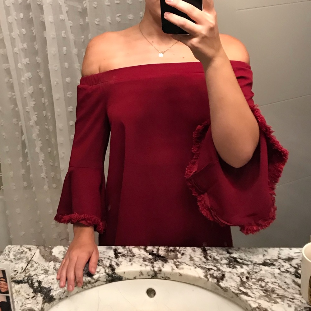 shoulder-less burgundy top with flared sleeves